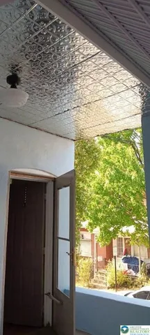 a view of backyard with green space