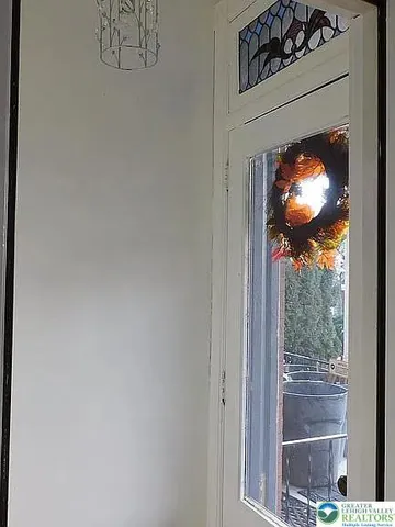 a view of a livingroom with furniture nad wooden floor