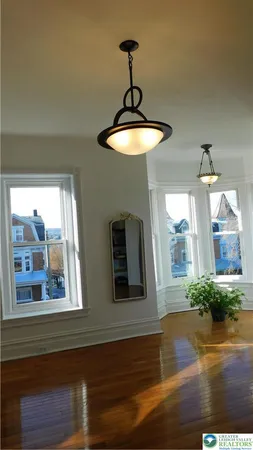 a view of residential house with wooden floor