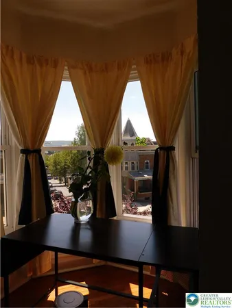 a view of an entryway with a door