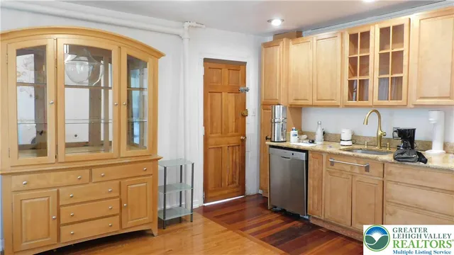 a view of an entryway with a door