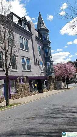 a front view of a multi story residential apartment building