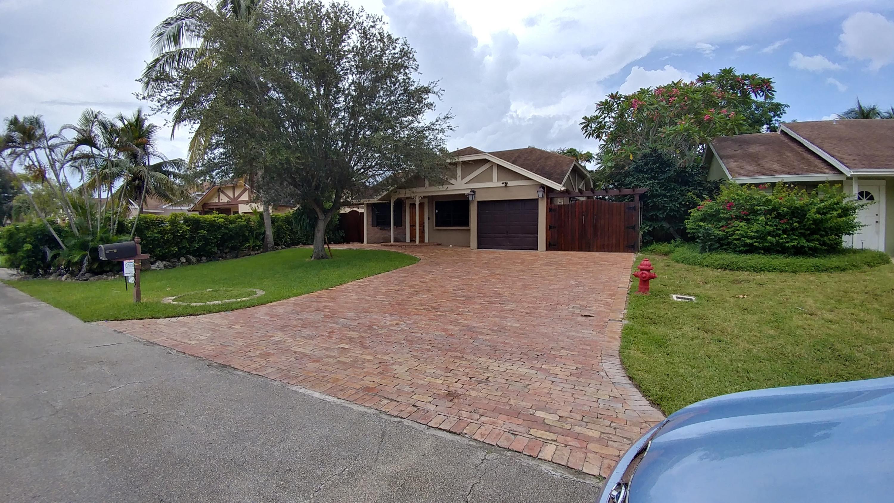 10622 Boca Entrada Boulevard Boca Raton, FL 33428 - Photo 1 of 22 Front 1