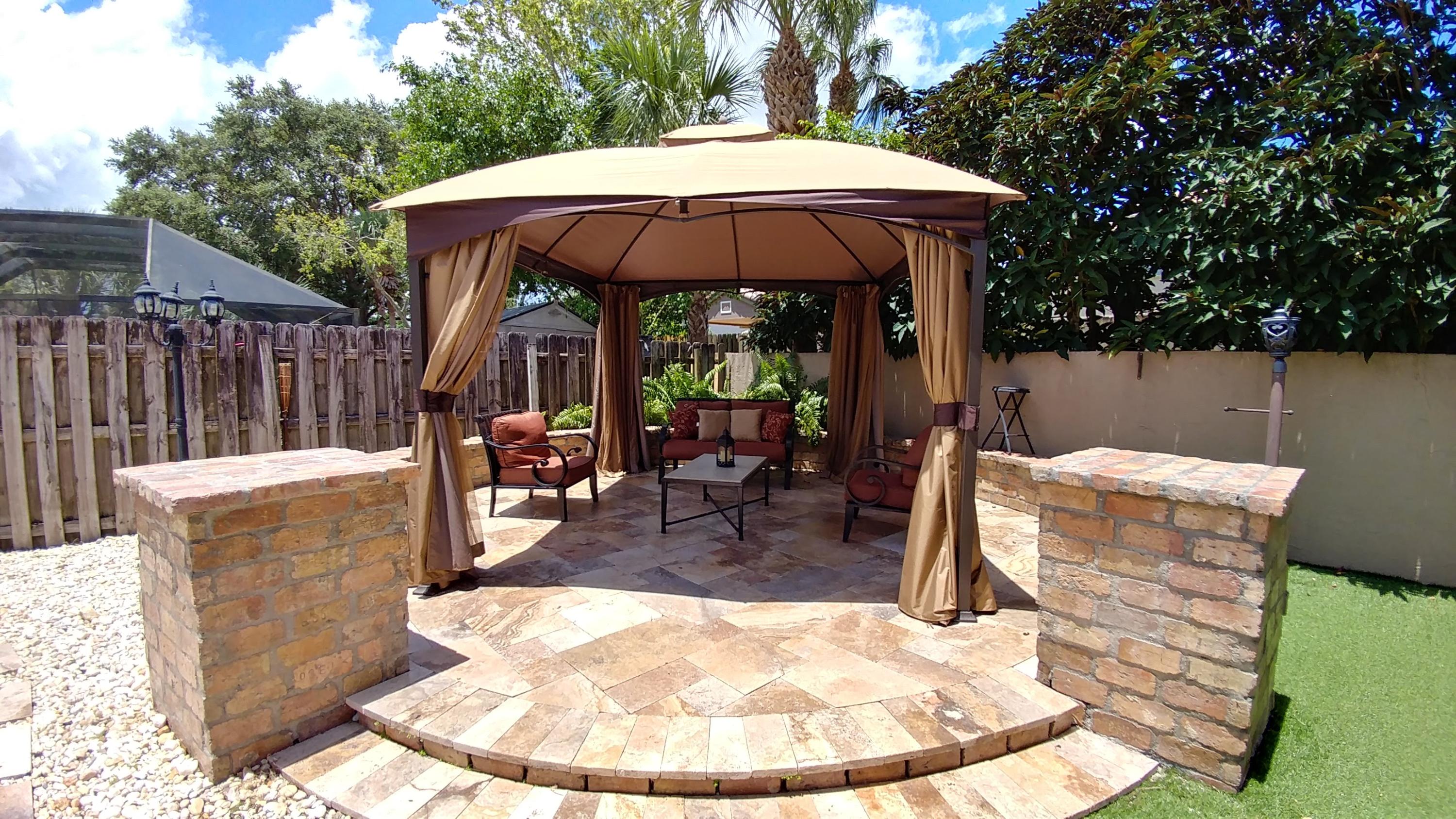 10622 Boca Entrada Boulevard Boca Raton, FL 33428 - Photo 16 of 22 Backyard Canopy
