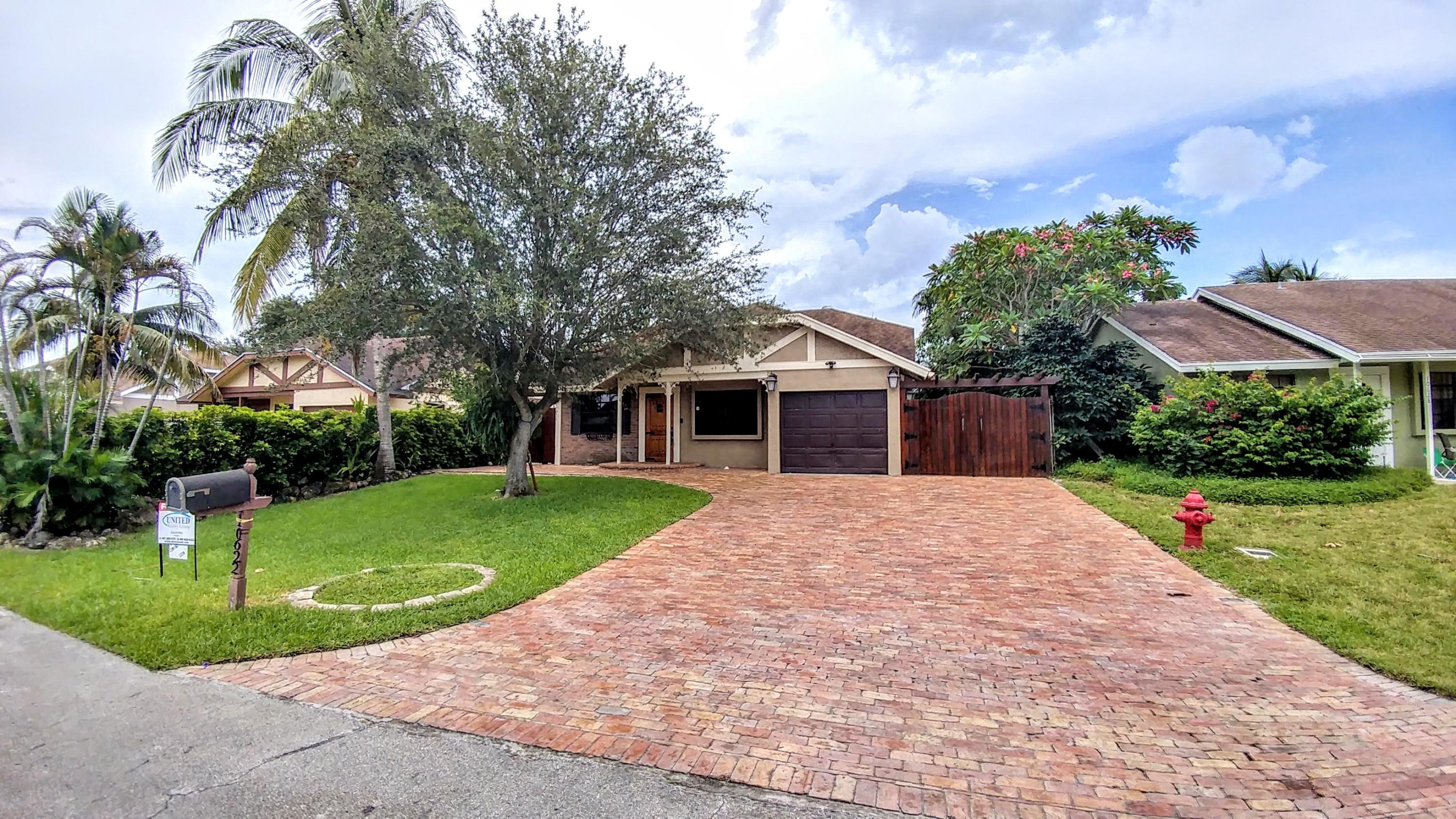 10622 Boca Entrada Boulevard Boca Raton, FL 33428 - Photo 2 of 22 Front2