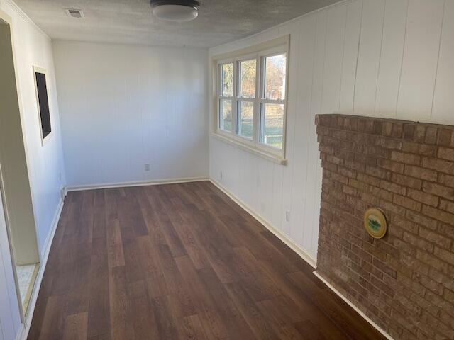 419 Front Avenue Salem, VA 24153 - Photo 12 of 14 an empty room with wooden floor and windows