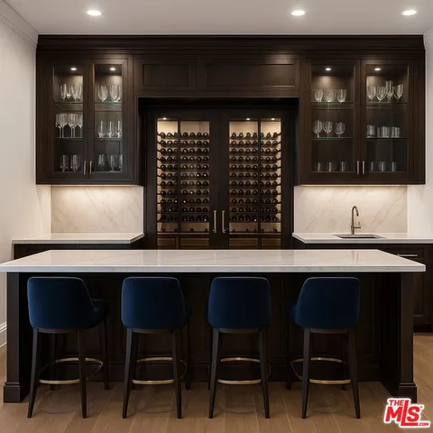 a kitchen with a sink cabinets and window