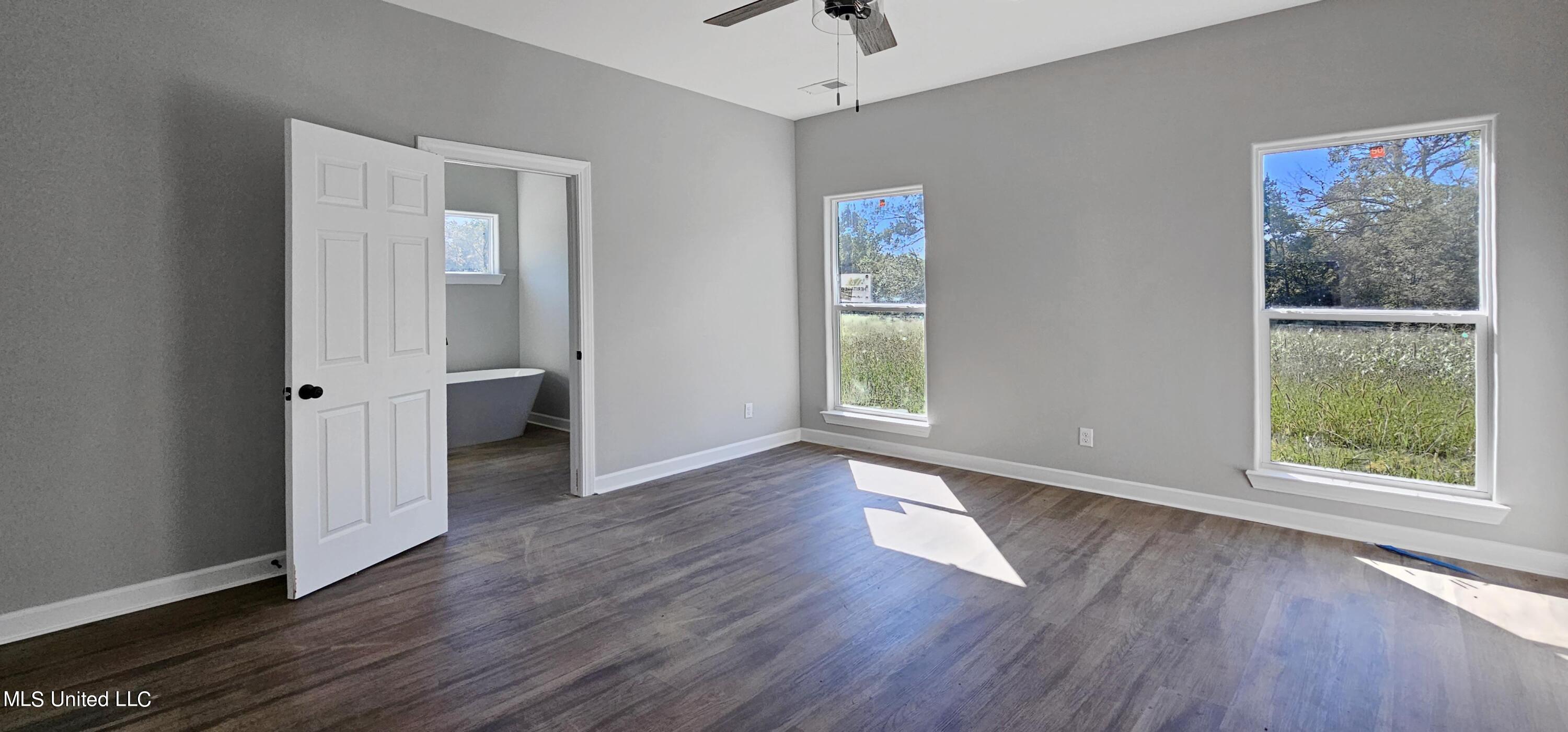 146 Rossville Road Holly Springs, MS 38635 - Photo 9 of 17 Primary Suite