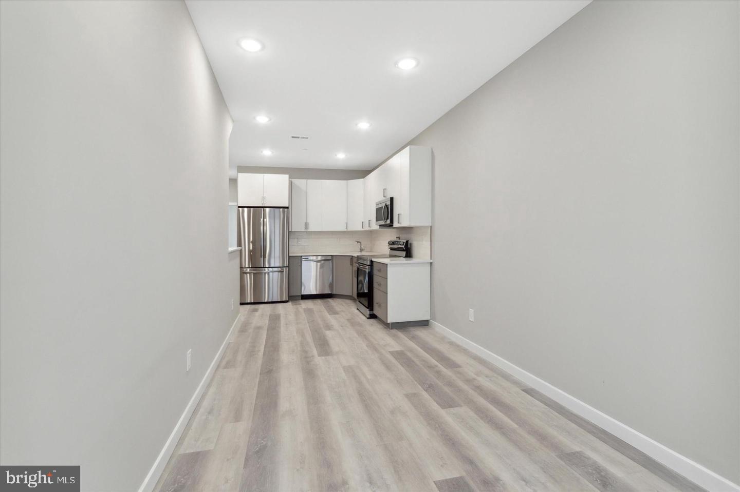 2424 Nicholas Street Philadelphia, PA 19121 - Photo 18 of 18 a view of kitchen with wooden floor