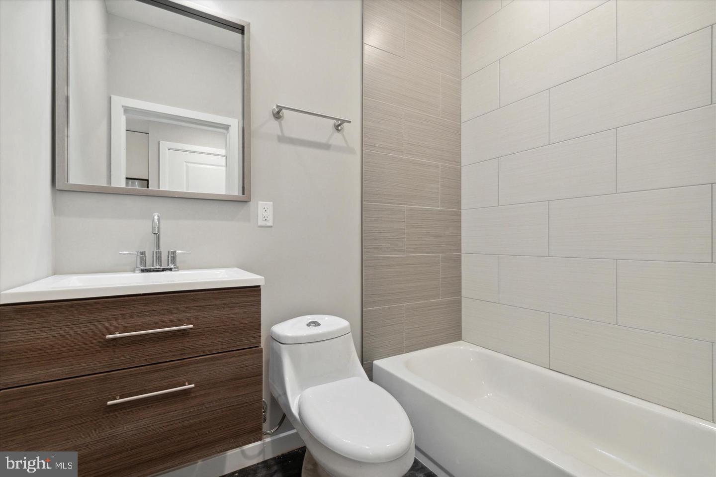 2424 Nicholas Street Philadelphia, PA 19121 - Photo 5 of 18 a bathroom with a sink a toilet and shower