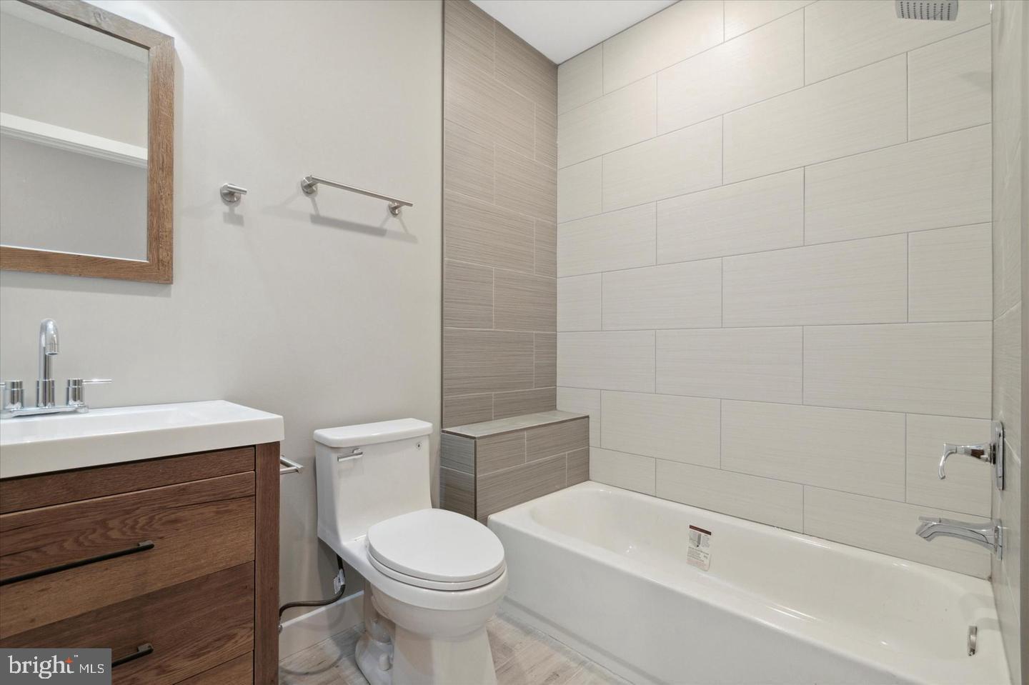 2424 Nicholas Street Philadelphia, PA 19121 - Photo 7 of 18 a bathroom with a sink a toilet and shower