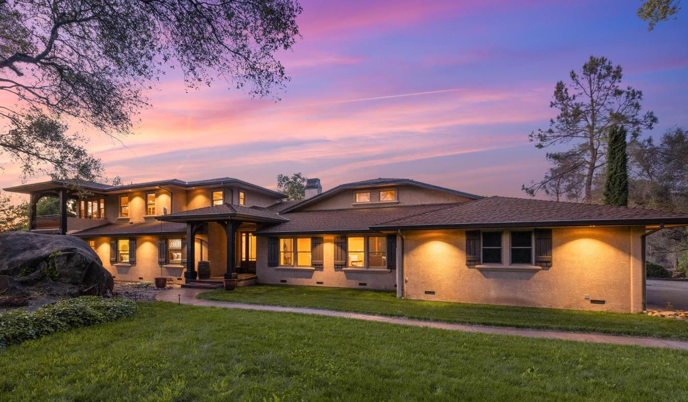 7021 Horseshoe Bar Road Loomis, CA 95650 - Photo 3 of 74 a front view of a house with a yard