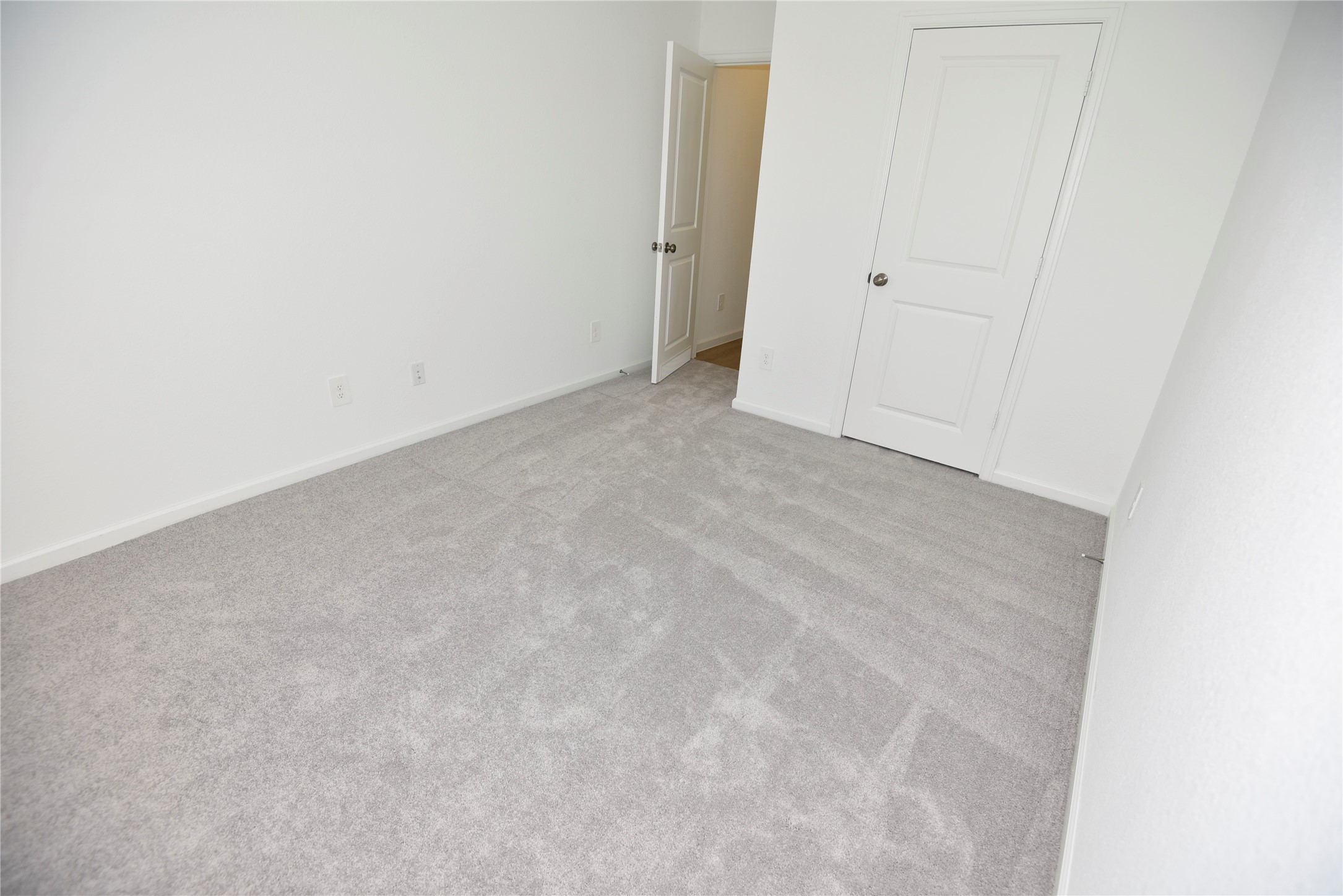15524 Leopard Lily Lane Conroe, TX 77302 - Photo 23 of 47 a view of an empty room