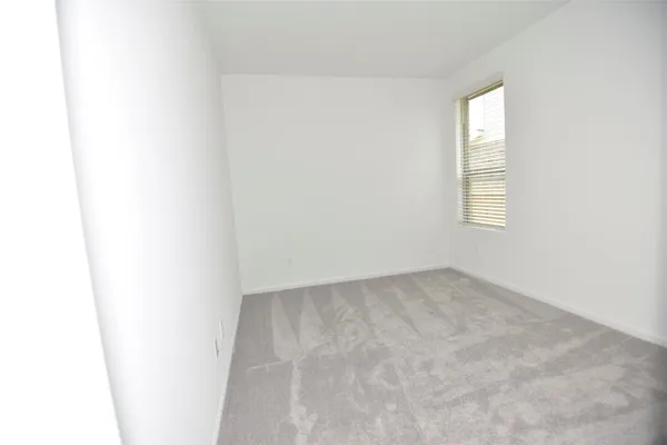 an empty room with an entryway
