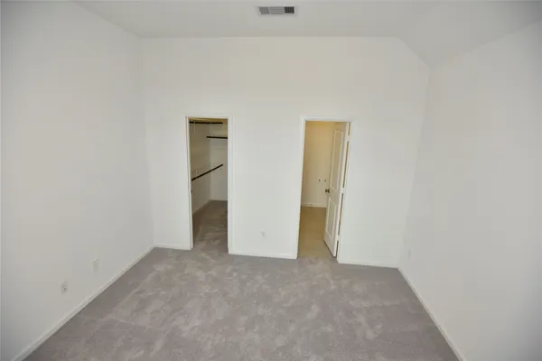 a view of a room with white walls