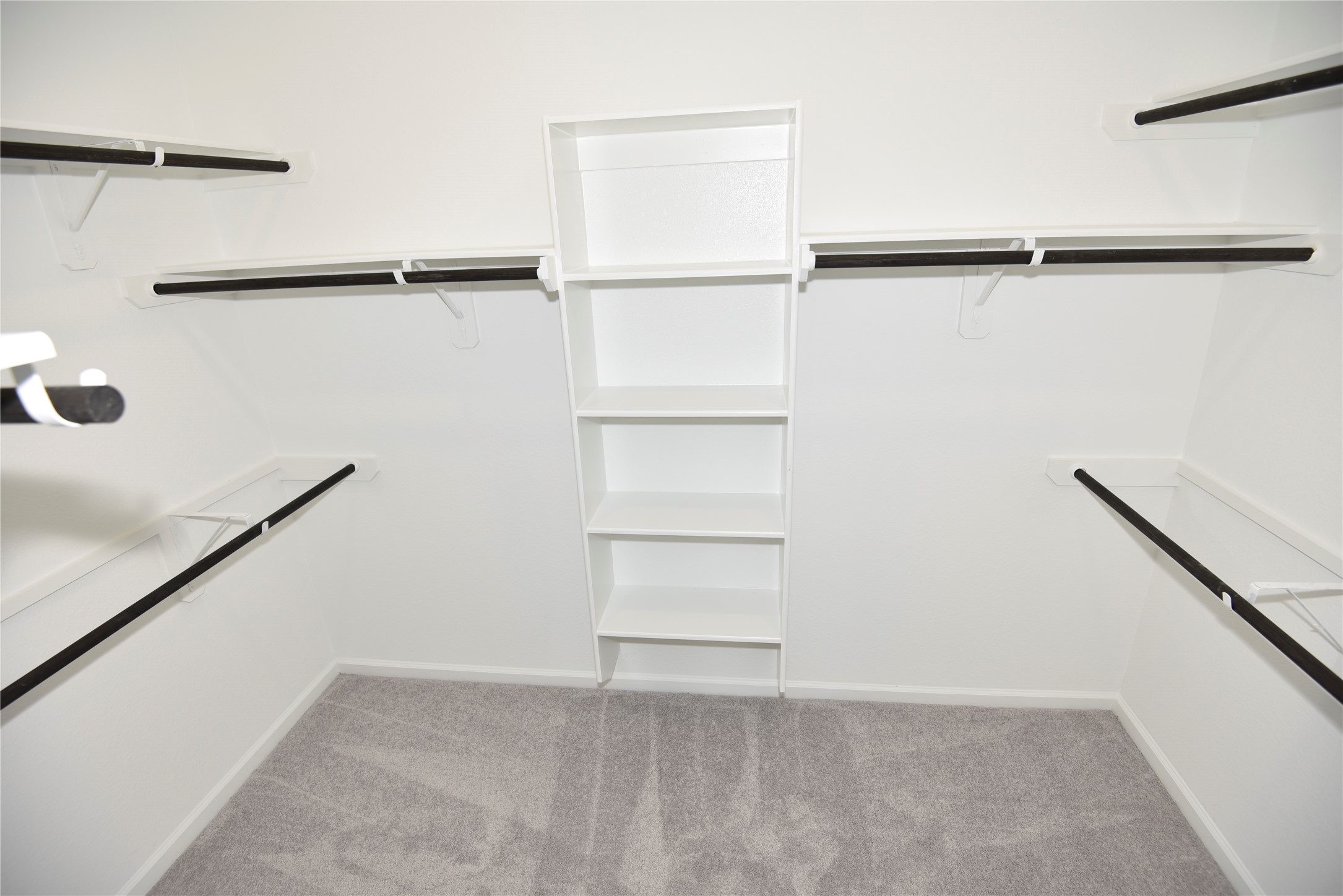 15524 Leopard Lily Lane Conroe, TX 77302 - Photo 36 of 47 a view of an empty walk in closet