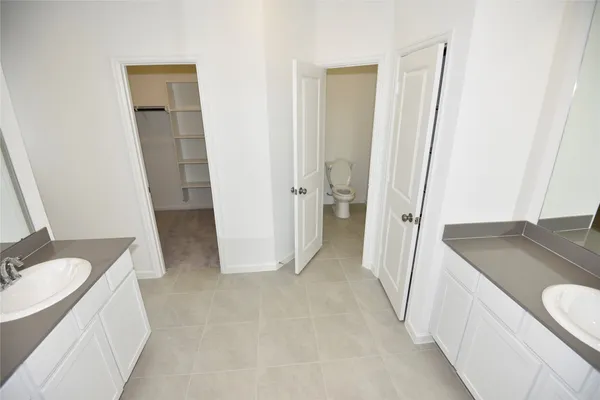 a view of an empty walk in closet