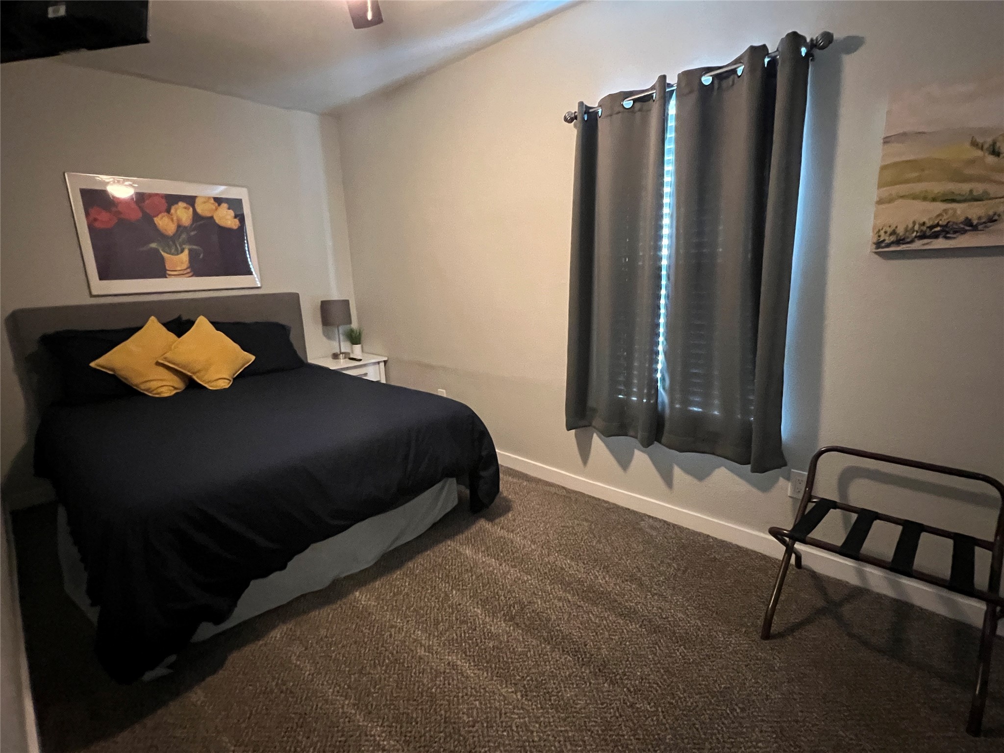 1909 Ruth Street Houston, TX 77004 - Photo 12 of 35 a bedroom with a bed and furniture