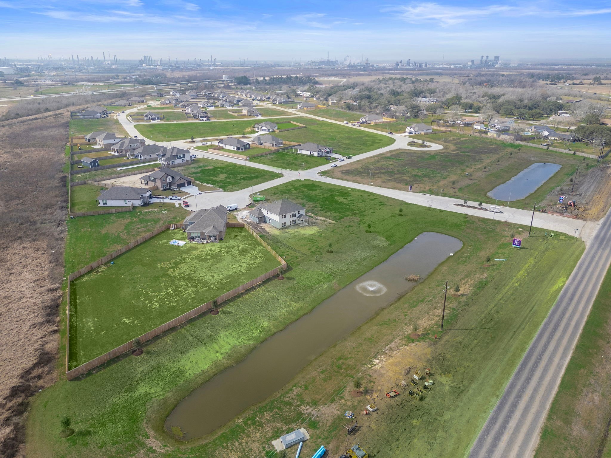 112 Bayou Bend Angleton, TX 77515 - Photo 25 of 27 a view of a lake with a city