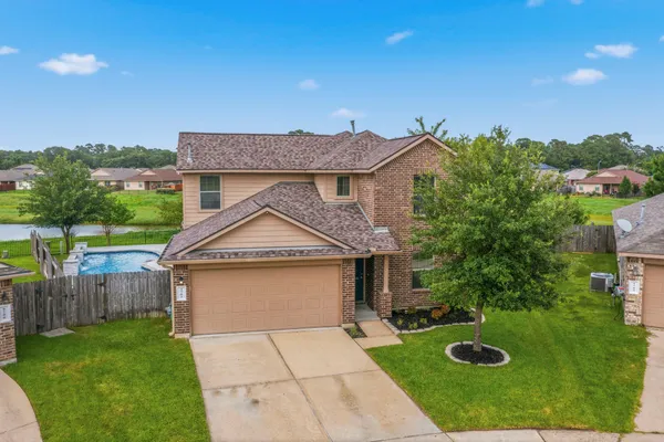 $450,000 | 9702 Jacy Creek Drive, Tomball, TX 77375