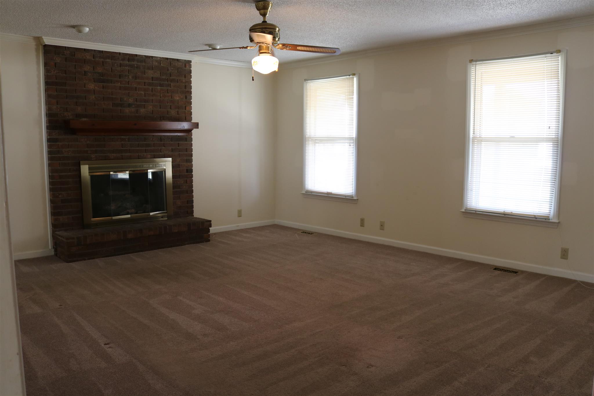 2306 Sulphur Springs Road Murfreesboro, TN 37129 - Photo 3 of 13 Inside, you are greeted with an extra large living room! Half this room didn't make it into the picture. Lovely place to relax in front of the gas fireplace!