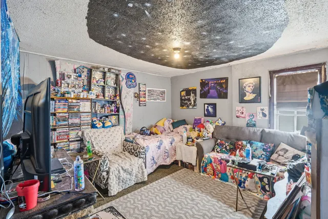 a bedroom with furniture