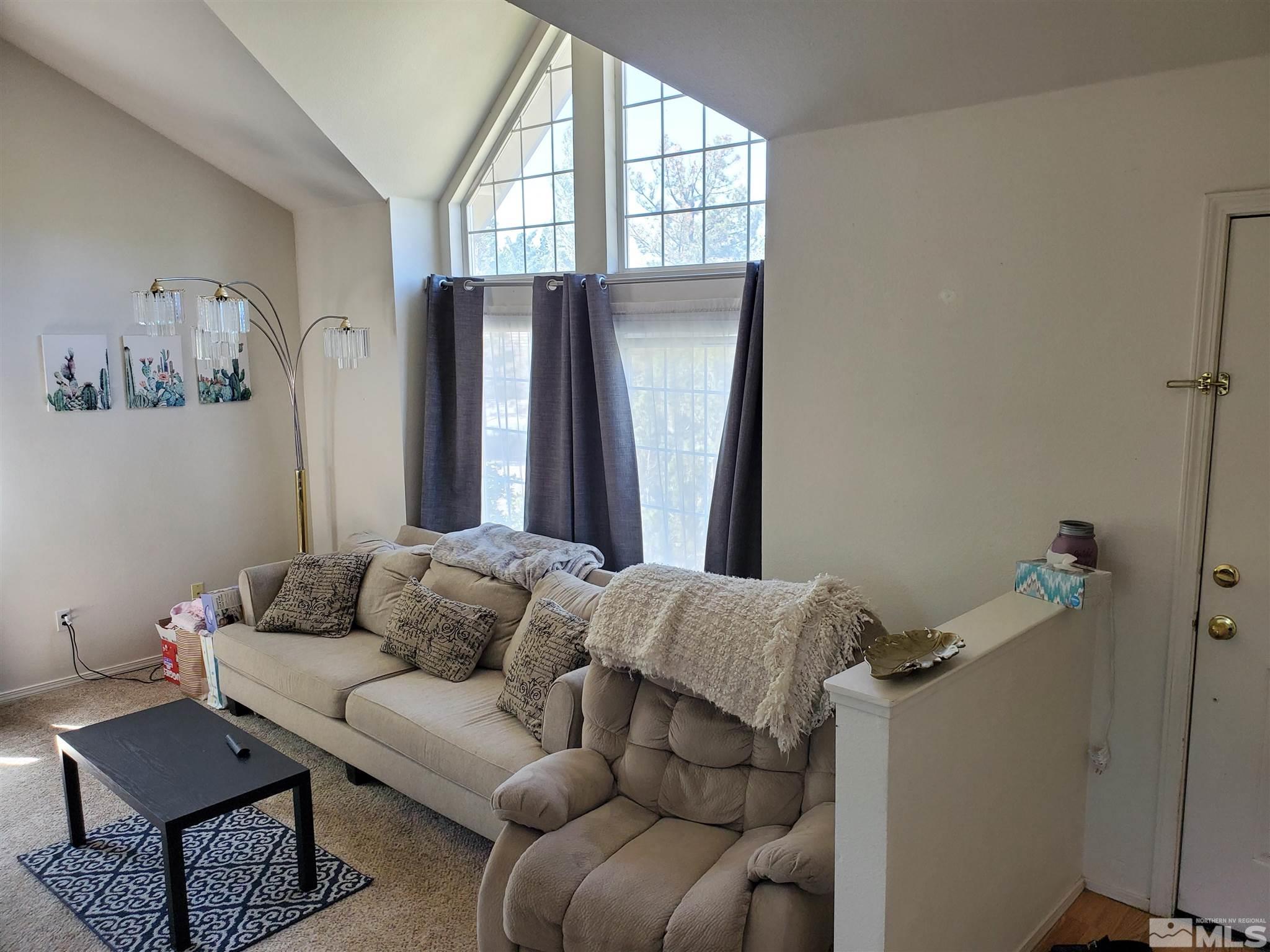 20 Sylvester Court Reno, NV 89521 - Photo 11 of 21 a living room with furniture and a window