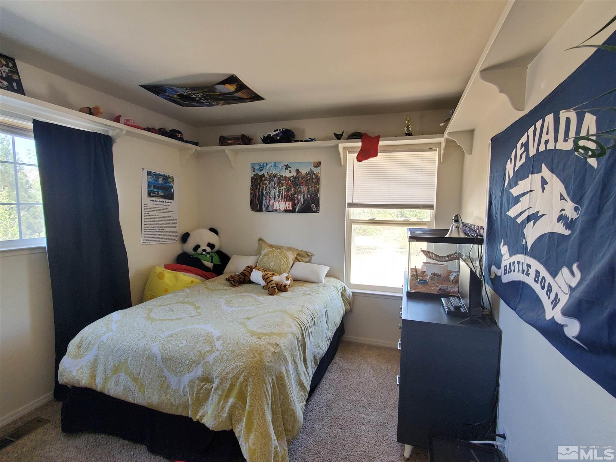 20 Sylvester Court Reno, NV 89521 - Photo 8 of 21 a bedroom with bed and a window
