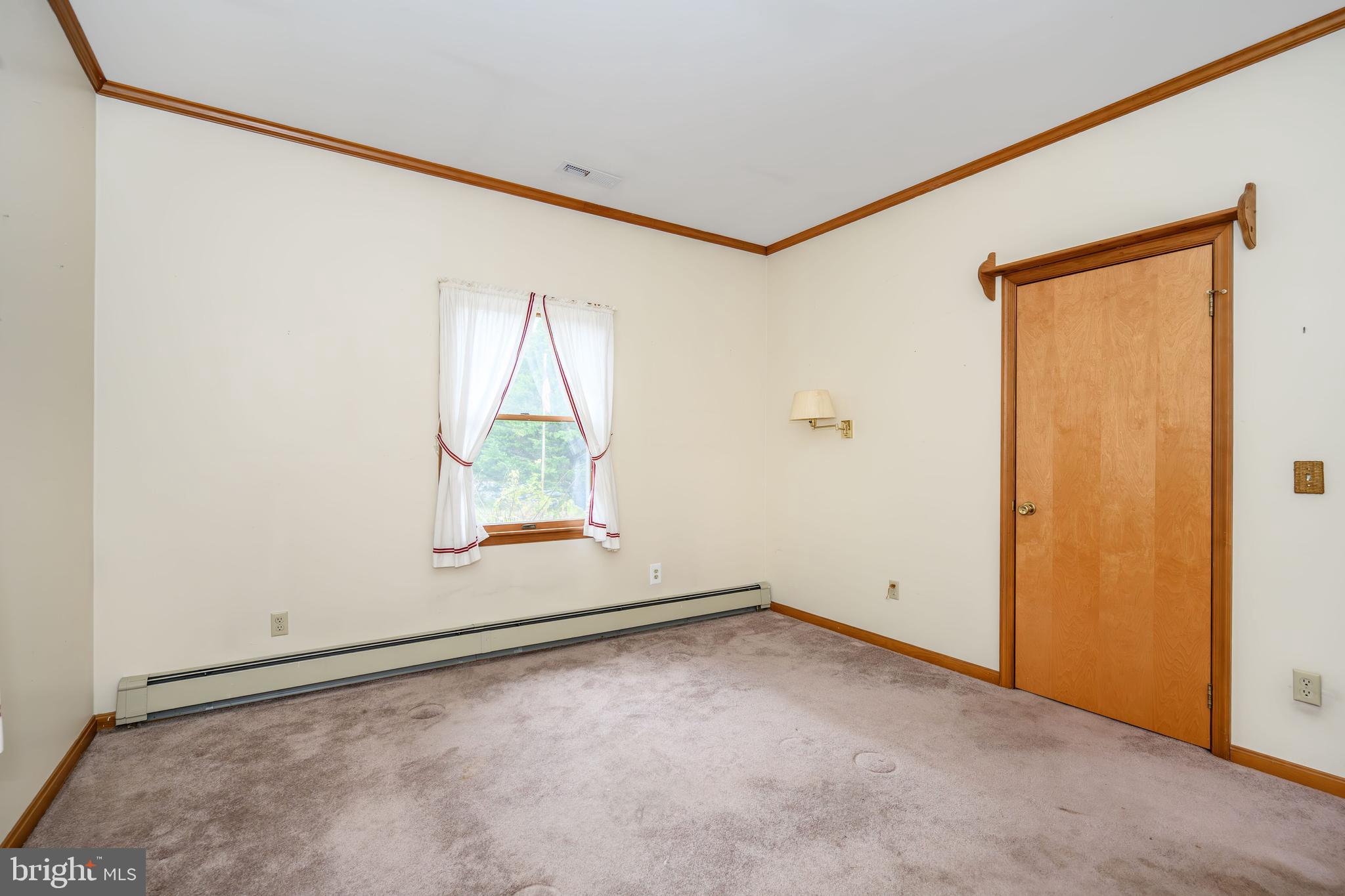 24029 Meadows Drive Ridgely, MD 21660 - Photo 24 of 39 an empty room with a window