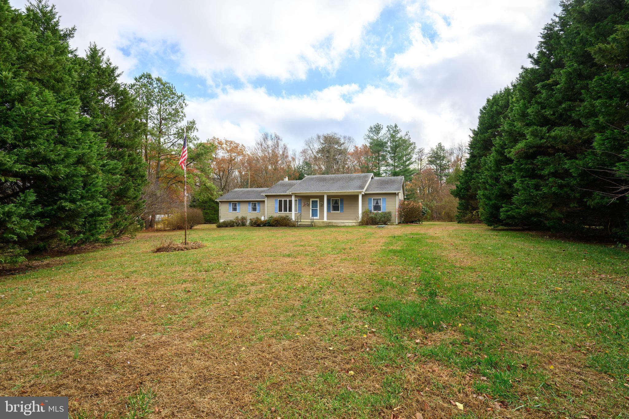 24029 Meadows Drive Ridgely, MD 21660 - Photo 3 of 39 a view of a house with a yard