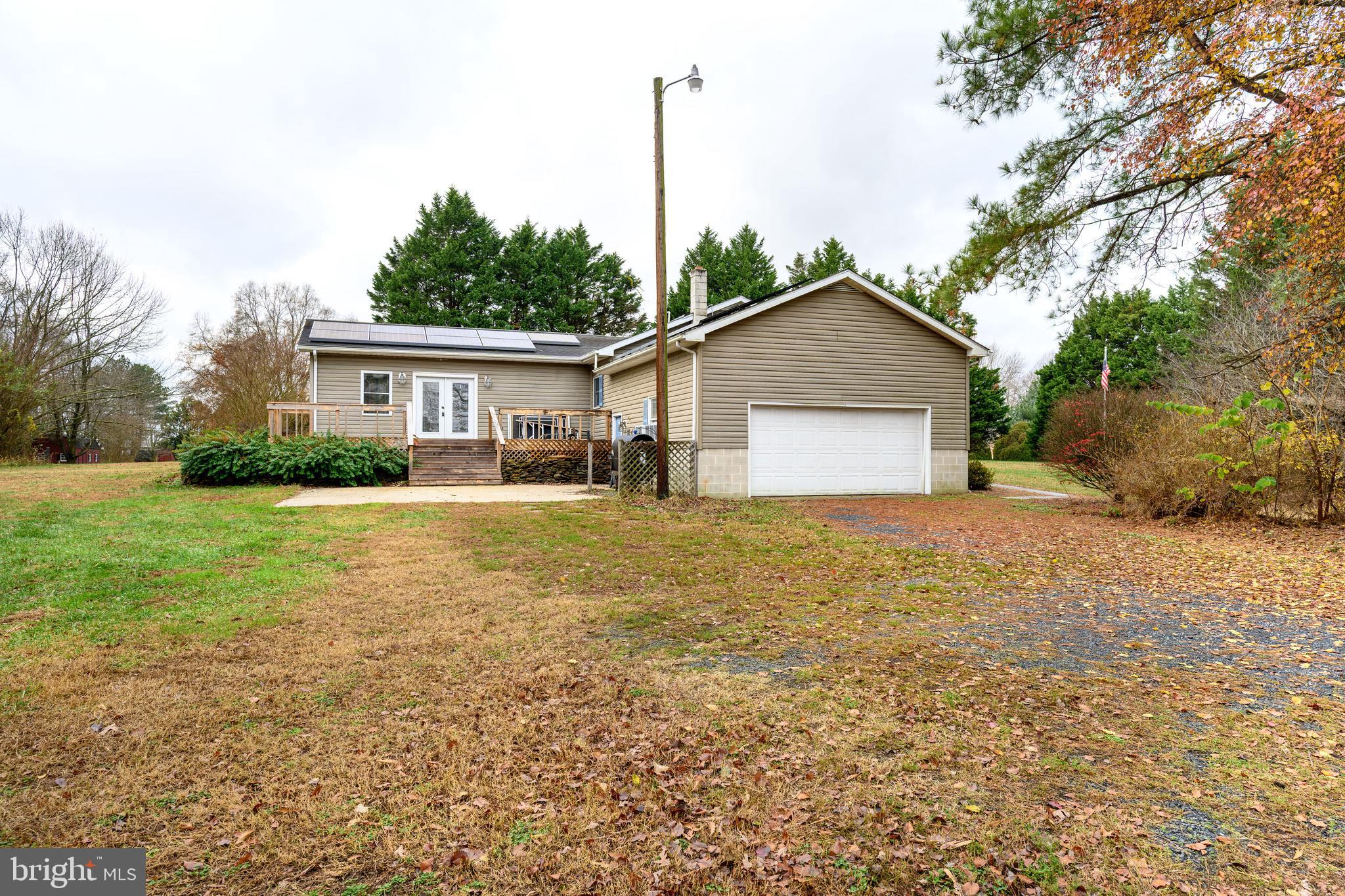24029 Meadows Drive Ridgely, MD 21660 - Photo 8 of 39 a house view with a garden space