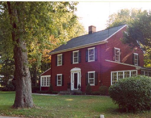 1359 Unquowa Road Fairfield, CT 06824 - Photo 1 of 1 a large brick building with a yard