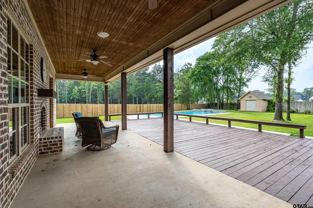 a view of sitting area with swimming pool and sitting area