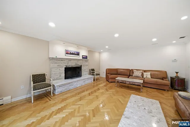a bathroom with a sink mirror and a shower