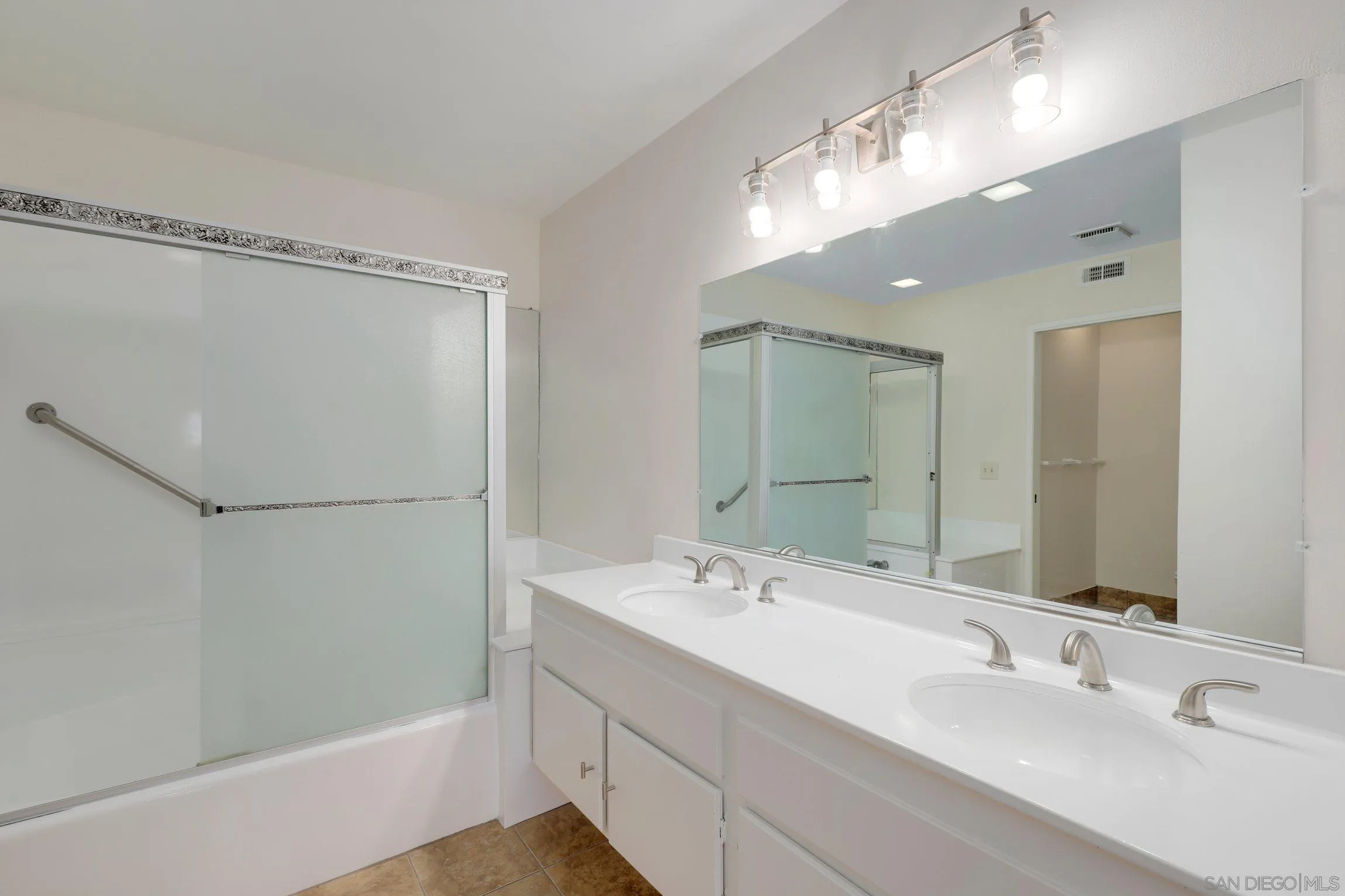 1666 Pala Lake Drive Fallbrook, CA 92028 - Photo 11 of 24 a bathroom with a double vanity sink mirror and double