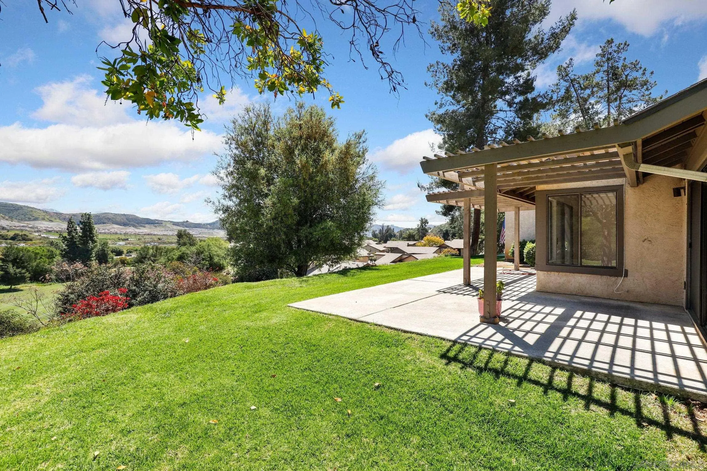1666 Pala Lake Drive Fallbrook, CA 92028 - Photo 16 of 24 a view of a backyard with garden