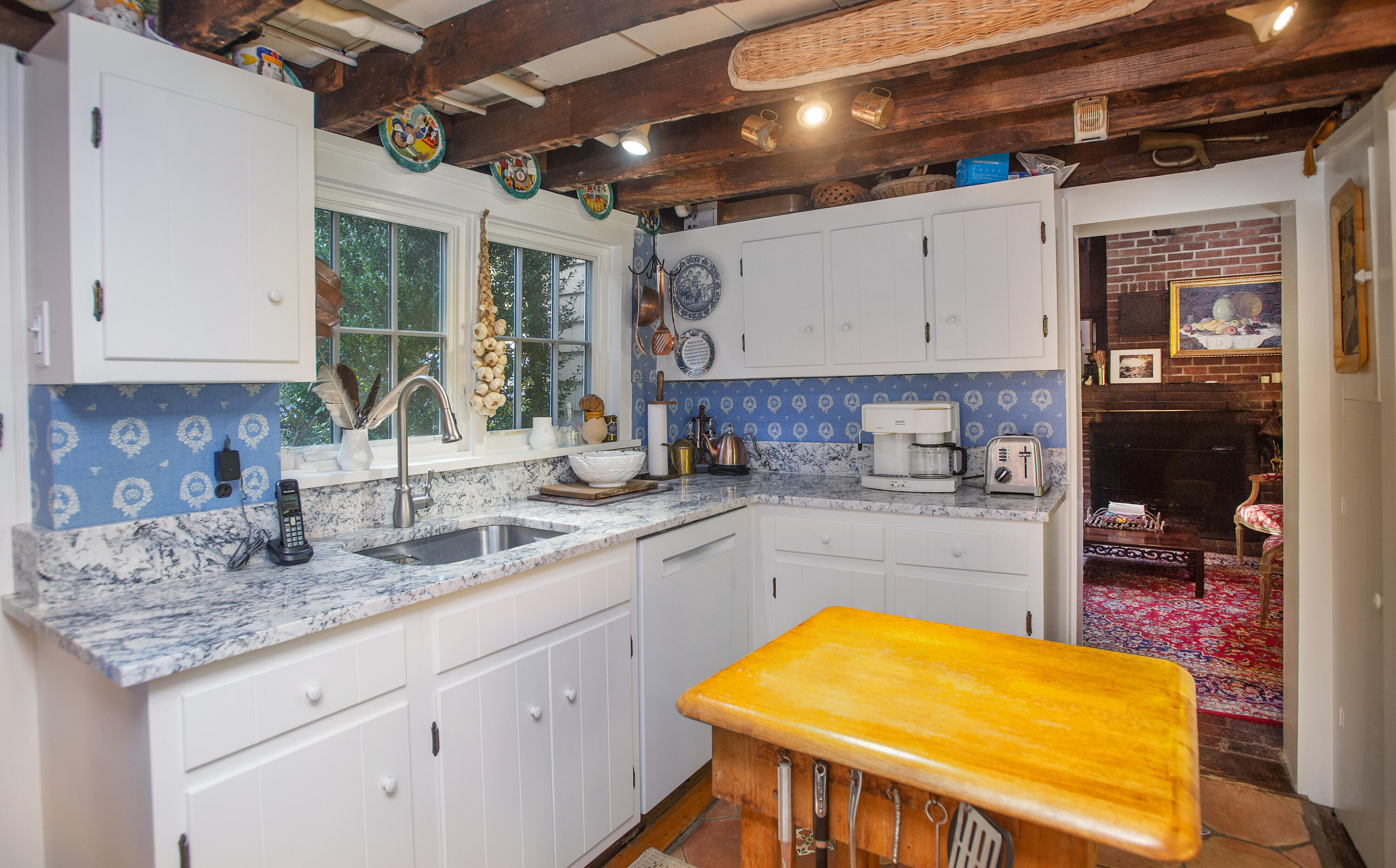 187 Perry Avenue Norwalk, CT 06850 - Photo 17 of 28 a kitchen with a sink and cabinets