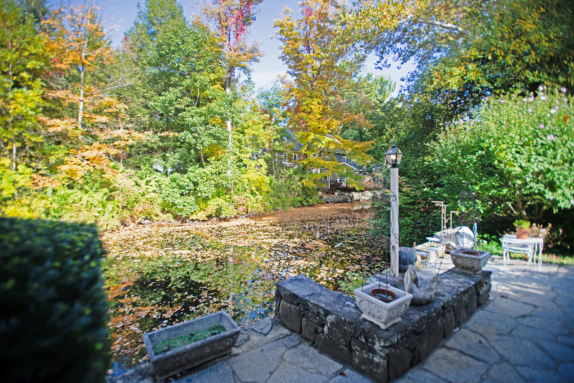 187 Perry Avenue Norwalk, CT 06850 - Photo 24 of 28 a view of a backyard with sitting area