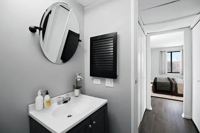 a bedroom with a bed and a couch