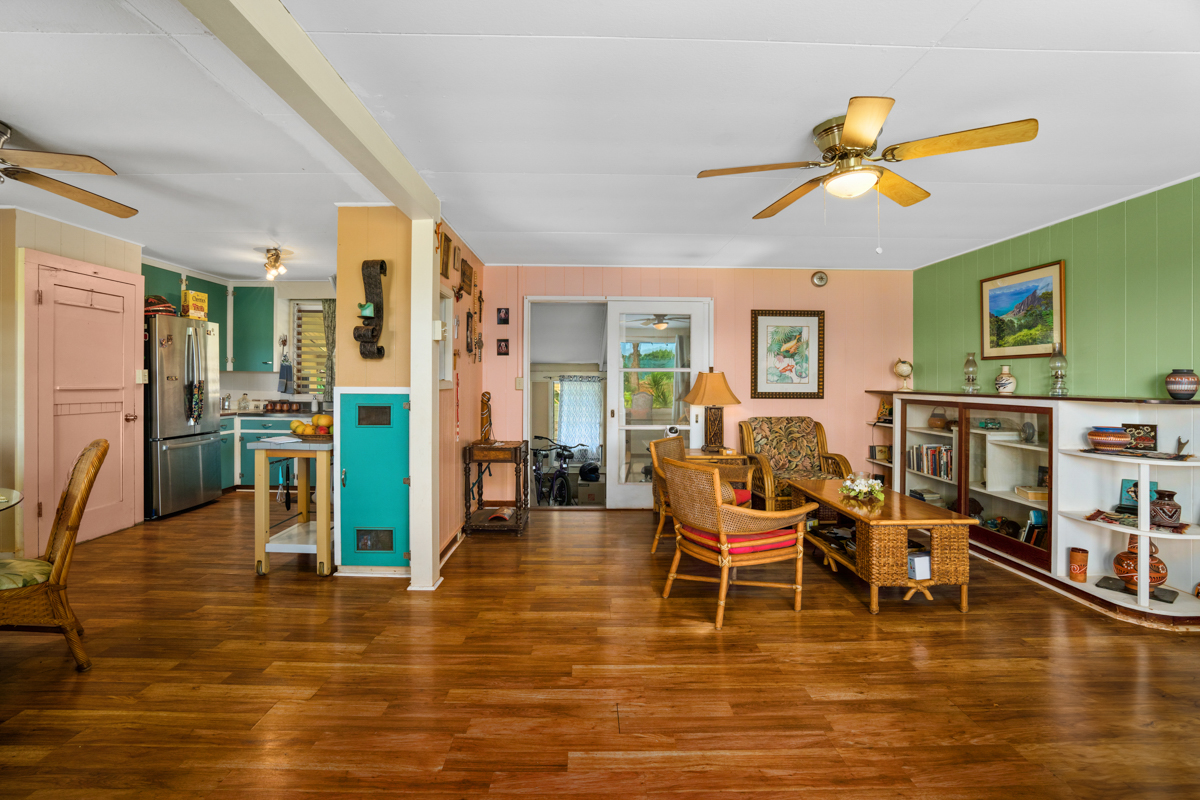 4669 Makeke Road Waimea, HI 96796 - Photo 3 of 24 a living room with fireplace furniture and a flat screen tv