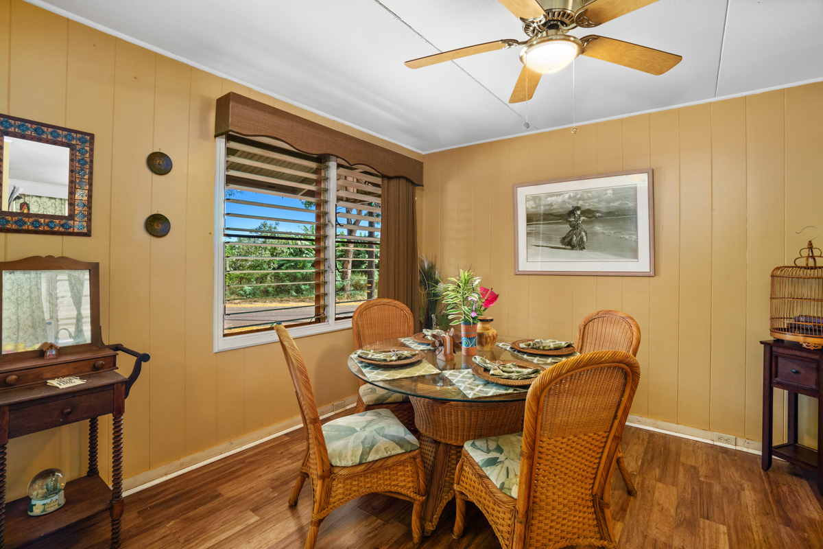 4669 Makeke Road Waimea, HI 96796 - Photo 8 of 24 a view of a dining room with furniture and wooden floor