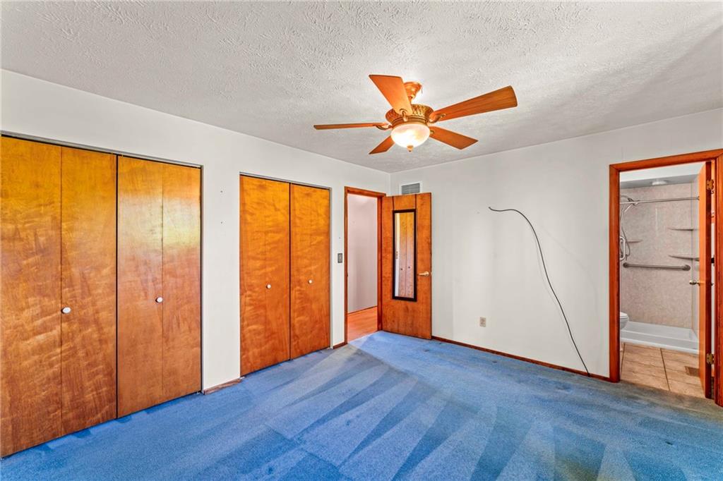 116 Jackson Circle McDonald, PA 15057 - Photo 17 of 33 an empty room with wooden floor and door