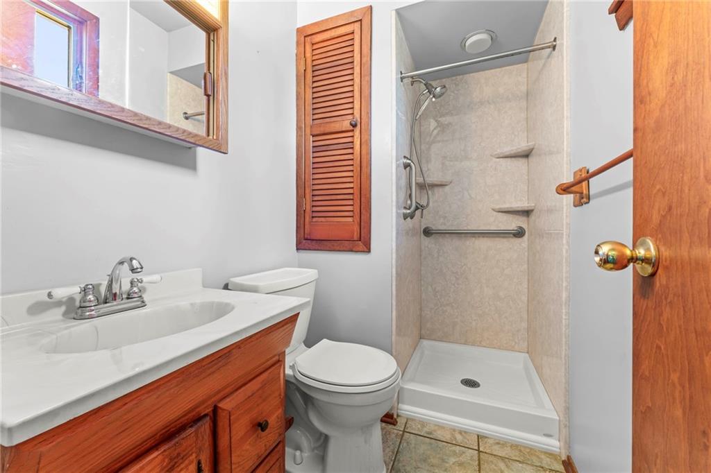 116 Jackson Circle McDonald, PA 15057 - Photo 18 of 33 a bathroom with a sink a toilet and shower