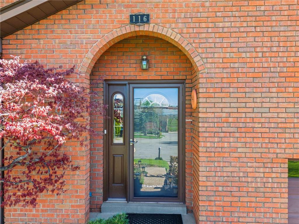 116 Jackson Circle McDonald, PA 15057 - Photo 2 of 33 a view of a brick house with a small entryway