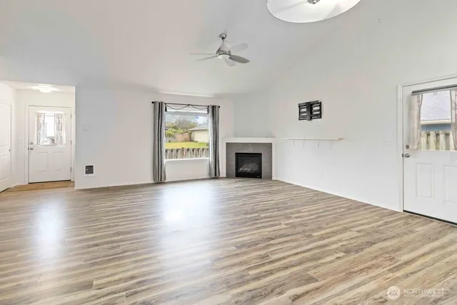a kitchen with stainless steel appliances granite countertop a stove and a refrigerator