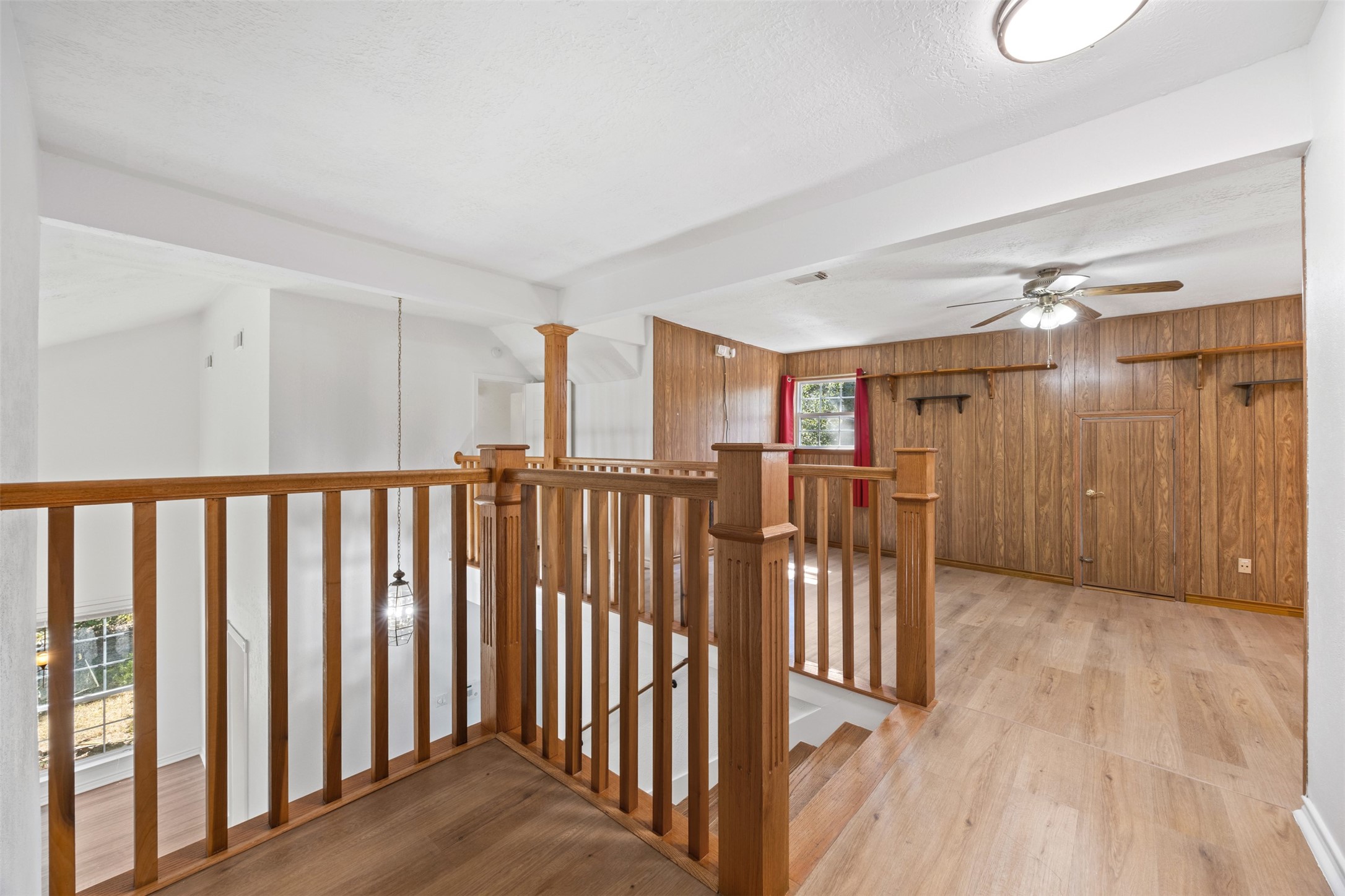 12 Dewthread Court Spring, TX 77380 - Photo 15 of 24 a view of hallway with wooden floor