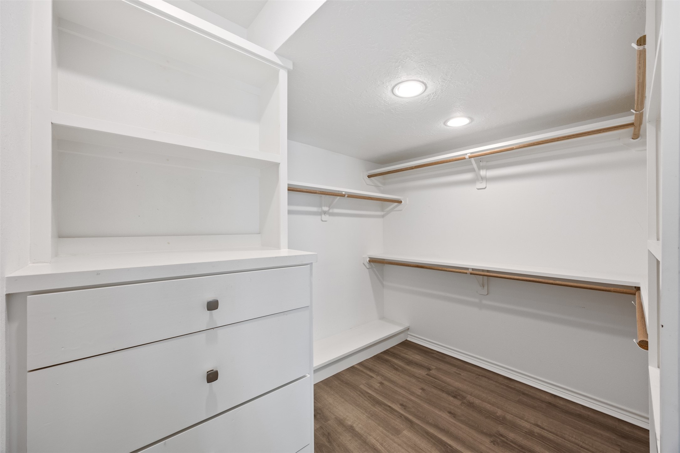 12 Dewthread Court Spring, TX 77380 - Photo 10 of 22 a view of an empty walk in closet