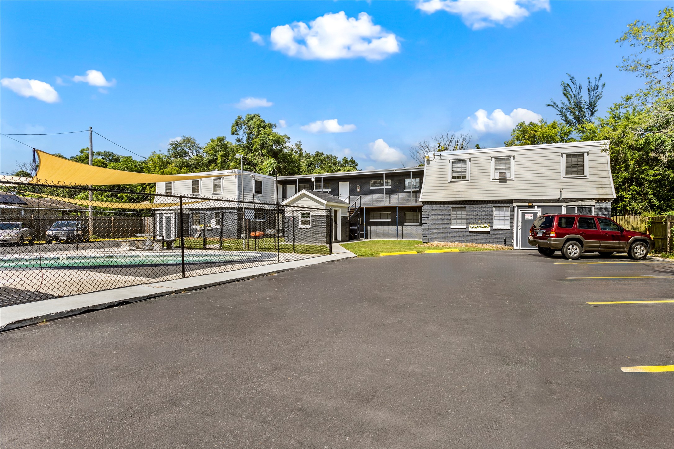 1825 Bayou Road La Marque, TX 77568 - Photo 4 of 15 a view of a swimming pool with outdoor seating