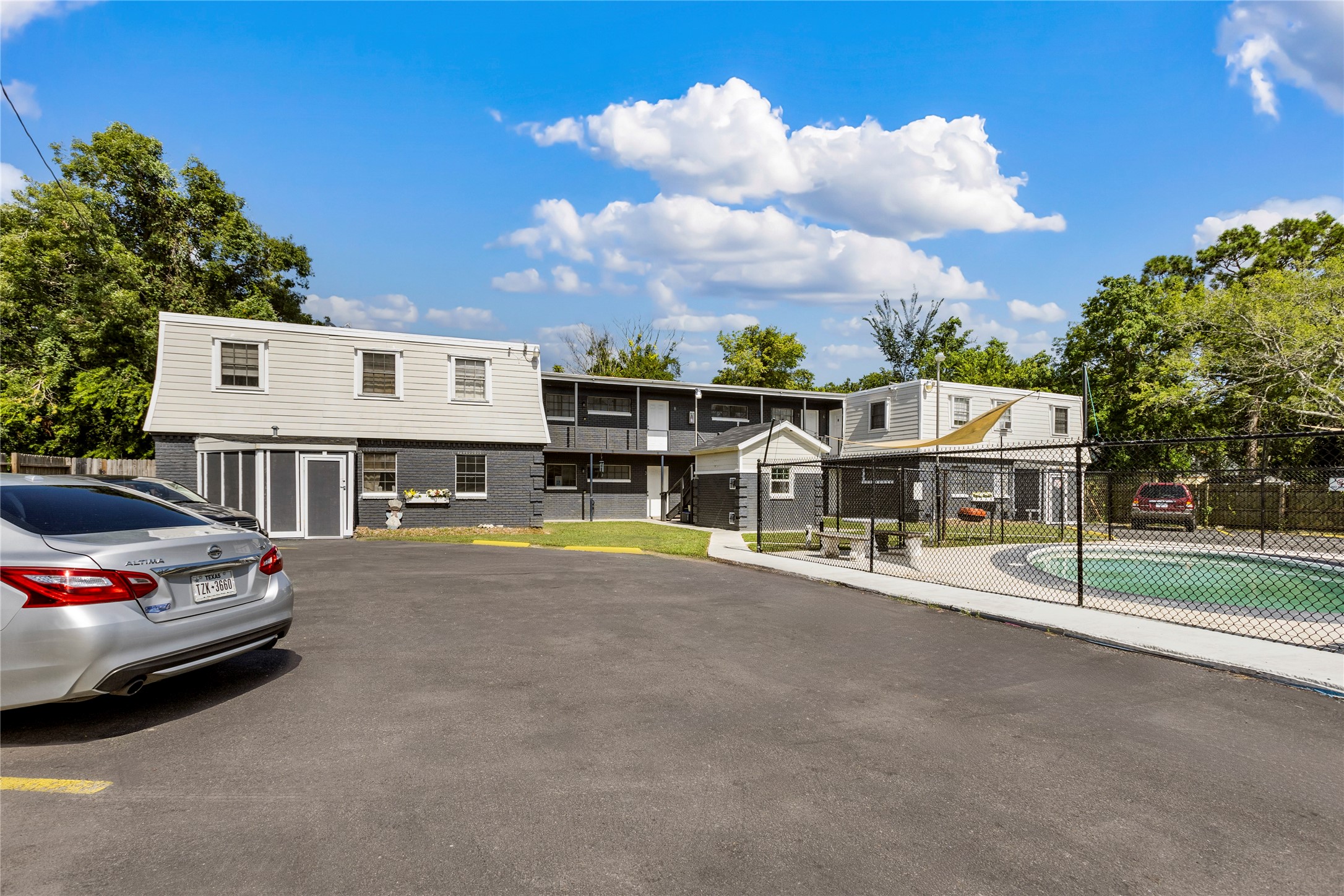 1825 Bayou Road La Marque, TX 77568 - Photo 6 of 15 a view of a car parked in front of a house