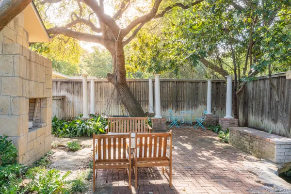 a garden view with a seating space